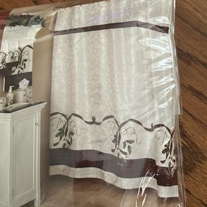 Lenox Christmas shower curtain with decorative rod hooks
